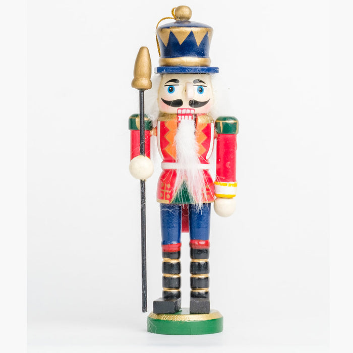 a nutcracker ornament holding a black & gold spear, wearing a red, blue, and green uniform with a blue and gold hat