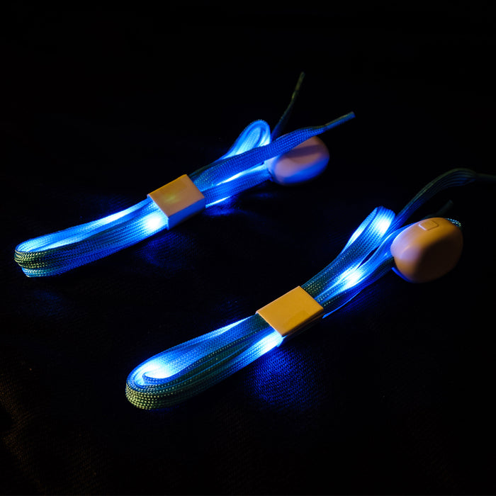 An upclose view of the Blue shoelaces lit up with Blue LED lights