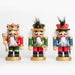 A short king nutcracker and two short soldier nutcrackers shown together